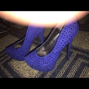 Midnight blue platforms heels with rhinestones.